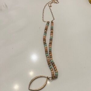 Elegant Beaded Necklace with Gold Pendant